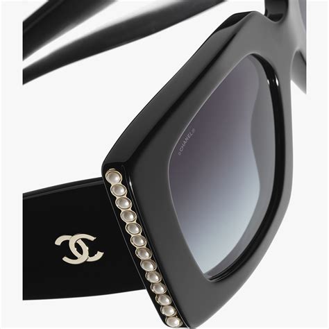 chanel black framed oversized sunglasses|Chanel sunglasses with on top.